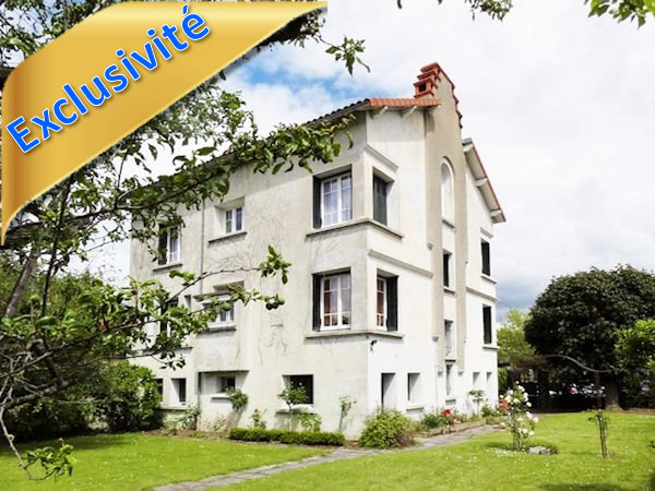 Villa Art Déco dans terrain arboré et fleuri à Riom (63)